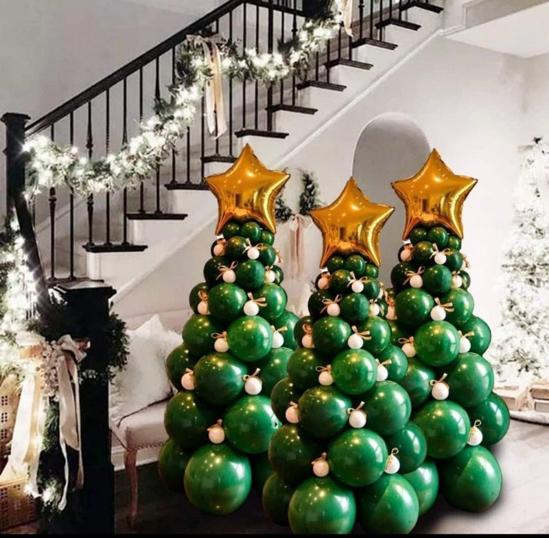 Bagaimana membuat pokok Krismas dengan belon?